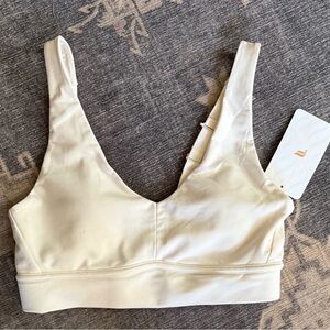 NWT Fabletics Ivory V-Neck Wireless Sports Bra. Size medium.